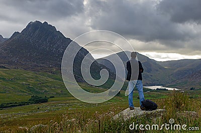 Man staring at Mt Tryfan in the Ogwen Valley, North Wales Editorial Stock Photo