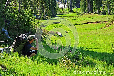 Hiker Taking Photos Stock Photo