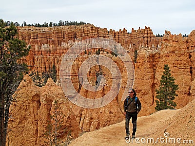 Hiker on a trail in Bryce Canyon National Park, Utah, United States Stock Photo