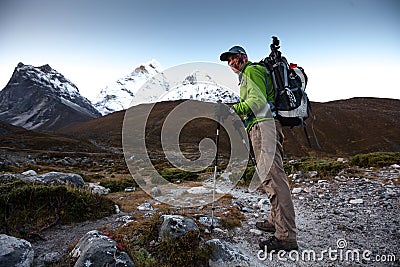 Hiker on the trek in Himalayas, Khumbu valley, Nepal Stock Photo