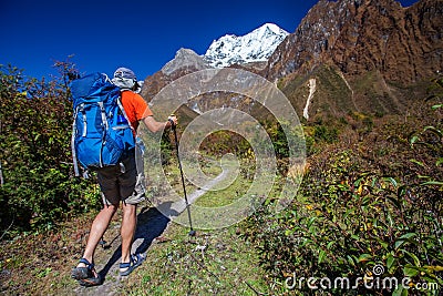 Hiker on the trek in Himalayas, Manaslu region, Nepal Stock Photo