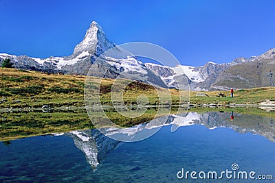 Hiker viewing Matterhorn Stock Photo