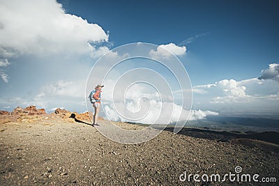 Hiker woman standing on viewpoint Stock Photo