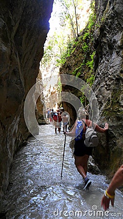 Hikers in the Chillar river, Nerja, Malaga Editorial Stock Photo