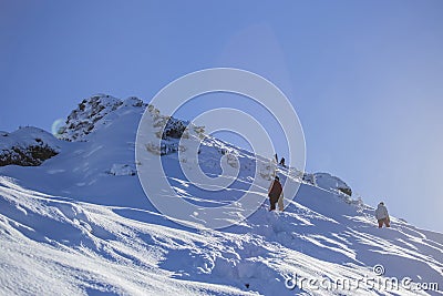 Hikers climb in heavy snow Editorial Stock Photo
