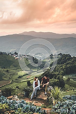 Hikers Couple on the mountain Adventure Time Stock Photo