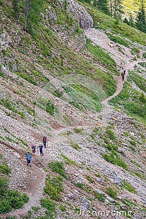 Hikers on a path on mountain slope Editorial Stock Photo