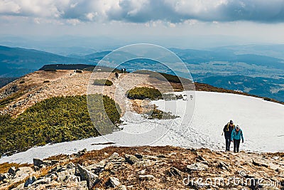 Hikers travel in the Babia Gora Mountain with a backpack Editorial Stock Photo
