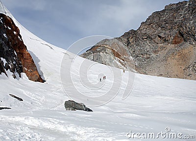 hikers, trekkers, mountaineers, white snow plain glacier Stock Photo