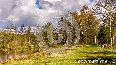 Hikers walking along a river Stock Photo