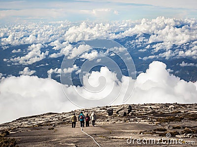 Hikers Walking at the top of Mount Kinabalu, Sabah, Malaysia Stock Photo