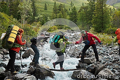 Hiking in the Altai mountains, amazing landscape of the valley of the mountain range. Group hiking, multi-day backpacking. Russia Editorial Stock Photo