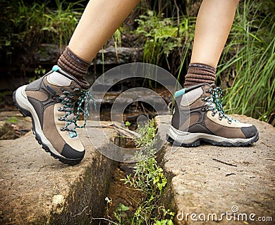 Hiking Boots On Female Hiker Stock Photo