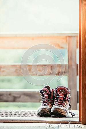 Hiking boots inside of a rustic mountain chalet, Austria Stock Photo