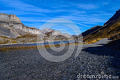 Hiking on the Gemmipass, with view of the Daubensee, Switzerland/Leukerbad Editorial Stock Photo