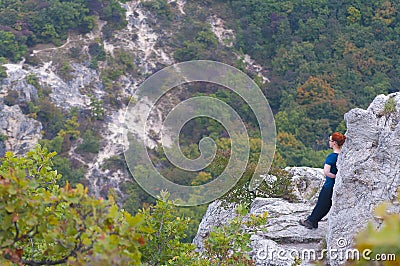 Hiking girl in the mountains Stock Photo