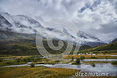 Hiking in the mountains. Rivers and mountain lakes, summer landscape of ridges and peaks. An amazing journey Stock Photo