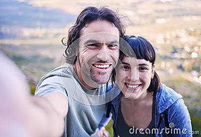 Hiking, selfie and portrait of couple in nature for adventure, holiday and journey on mountain. Travel, dating and happy Stock Photo