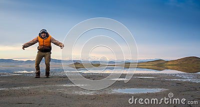 Hiking tourist have a rest in his camp at night Stock Photo