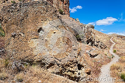 Hiking trail along the palisades at the Clarno Unit of the John Day Fossil Beds National Monument, Oregon, USA Stock Photo