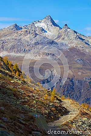 Hiking trail in the Engadin Valley above St. Moritz, Switzerland Stock Photo