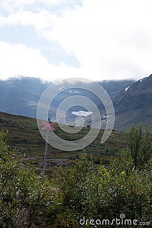 Hiking trail up to lake Trollsjon in Swedish lapland during early morning. Stock Photo