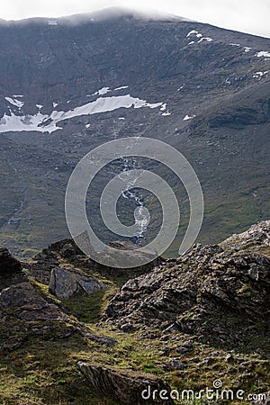 Hiking trail up to lake Trollsjon in Swedish lapland during early morning. Stock Photo