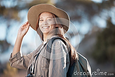 Hiking woman, portrait and smile for travel, summer and explore forest with backpack, excited and happy. Explorer girl Stock Photo