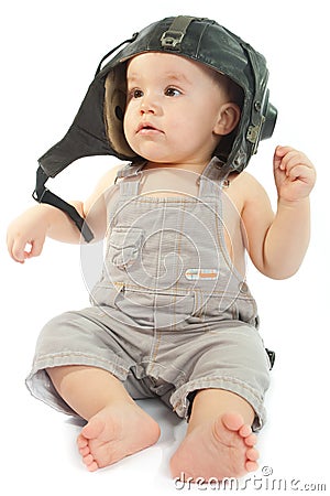 Ð¡hild in a helmet of the tankman Stock Photo