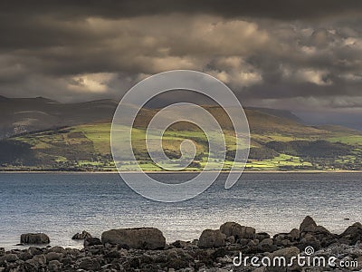 Hill landscape in Wales lit with beautiful grazing light Stock Photo