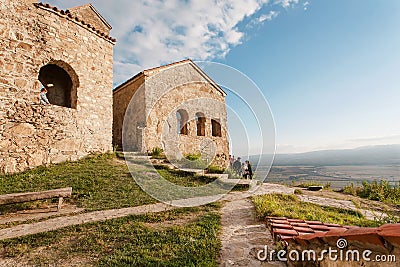 Hill top with people discovering the ancient Christian monastery Nekresi y Editorial Stock Photo