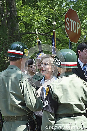 Hillary Clinton speaks with members of military Editorial Stock Photo