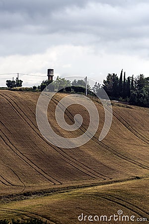 Hills landscape with water tower Stock Photo