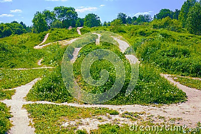 On the green hills there are many different challenging tracks for cycling trials and a race track Stock Photo