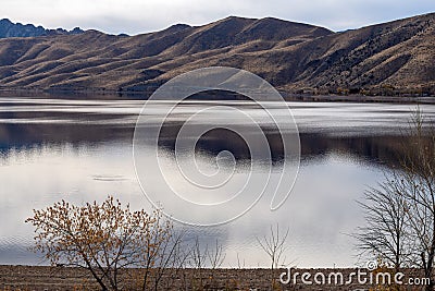 Hills reflecting in Topaz Lake on the Nevada California border, USA Stock Photo