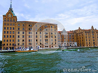 Hilton Molino Stucky is a luxurious Venetian hotel housed in a restored mill flour grinding plant on the shore of the island of Stock Photo