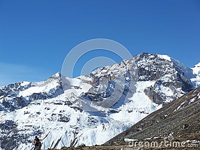 Vacations in summer on a snowy mountain Editorial Stock Photo