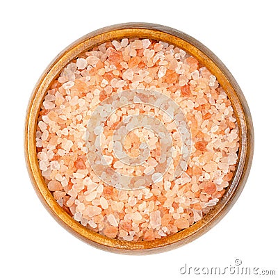 Himalayan salt, coarse crystals, table salt in a wooden bowl Stock Photo