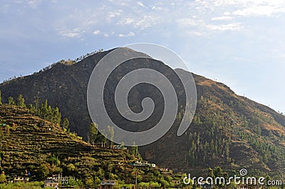 Himalayan village situated on cliffs of mountain Stock Photo