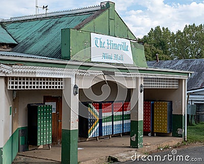 The Himeville mini mall with mailboxes painted in the colours of the South African flag. Editorial Stock Photo