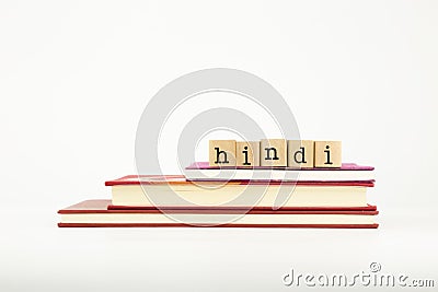 Hindi language word on wood stamps and books Stock Photo