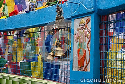 Hindu and buddhist religious symbols, prayer flags and bell Stock Photo