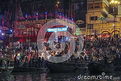 Hindu ceremony in Varanasi as seen from a boat by night, India Editorial Stock Photo