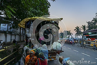 Hindu devotees getting up to a truck to reach Gangasagar, shot at Babughat, Editorial Stock Photo
