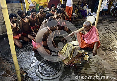 The Hindu devotees performed a ritual in the eve of Gajan festival in Kolkata. Editorial Stock Photo