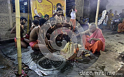 A Hindu devotees performed a ritual in the eve of Gajan festival in Kolkata. Editorial Stock Photo