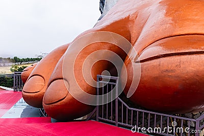 hindu god lord shiva statue foot fingers at morning from unique perspective Stock Photo