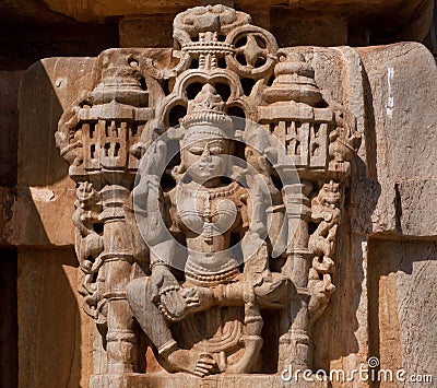 Hindu goddess Lakshmi on the ancient front of traditional indian stone temple. Rajasthan Editorial Stock Photo