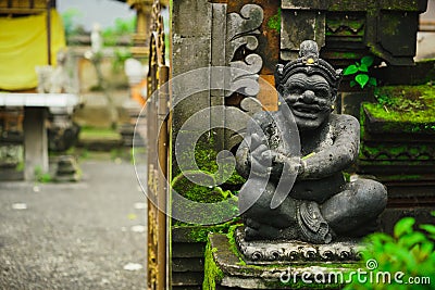 Hindu idol of the deity stone statue sitting at the entrance of the house. Stock Photo