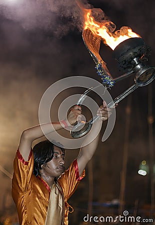 Hindu Man at Ganga Aarti Ceremony Editorial Stock Photo